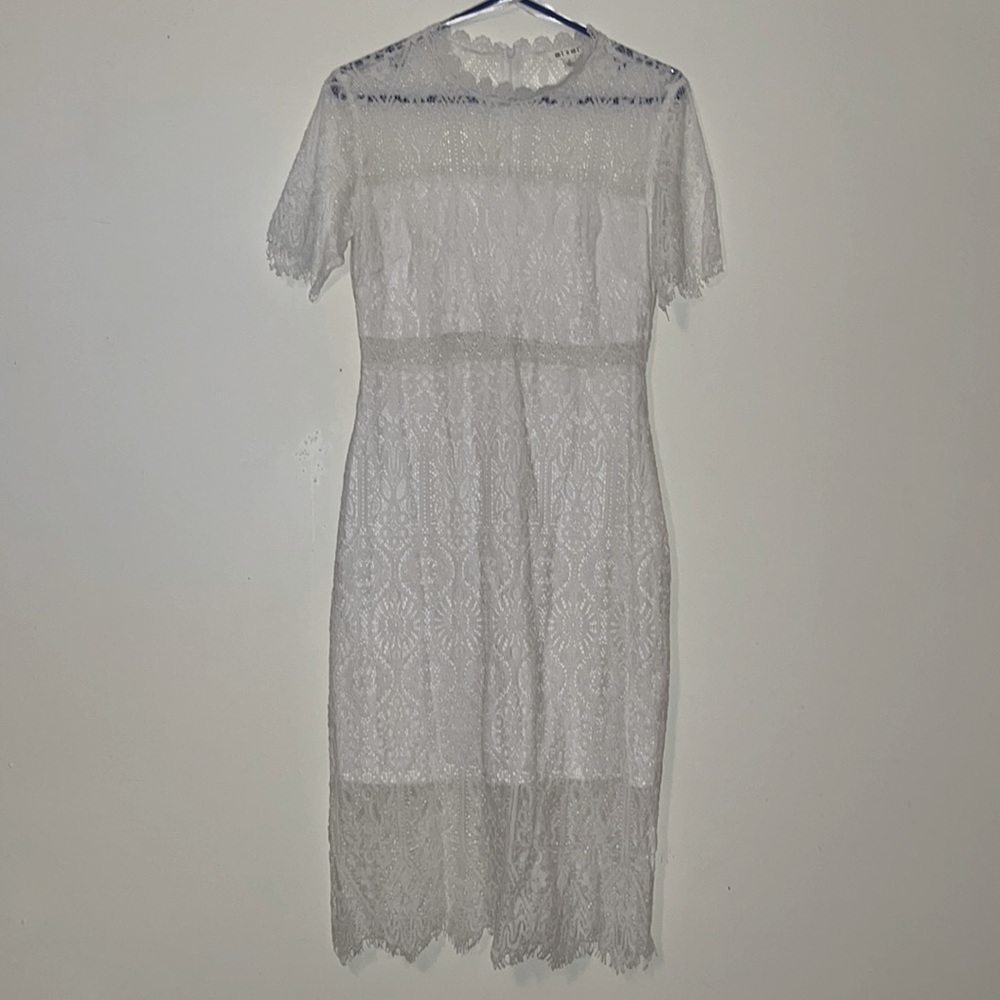 Perfect dress for a rehearsal dinner or bridal shower!